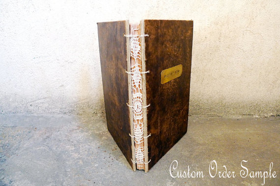 Rustic Wedding Guestbook by Spellbinderie. Note the vintage needlework she included!