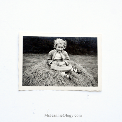 Little Carola on haystack circa 1957. $6.00 Love her shoes!