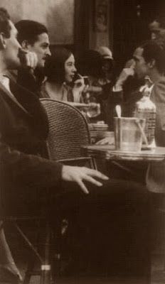 Ernest amid the 1920's Parisian cafe scene.